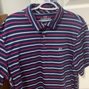 Vineyard Vines Performance Polo. Dark Navy blue with white and red stripes. LG.